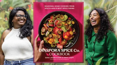 Picture of authors Sana Javeri Kadri and Asha Loupy with a picture of the cover of their book "The Diaspora Spice Company Cookbook"